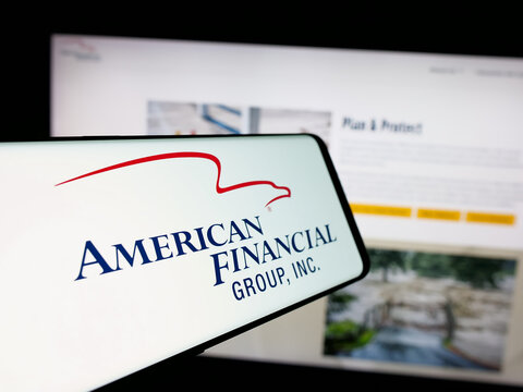 Stuttgart, Germany - 10-01-2024: Mobile phone with logo of American company American Financial Group Inc. on screen in front of website. Focus on center of phone display.