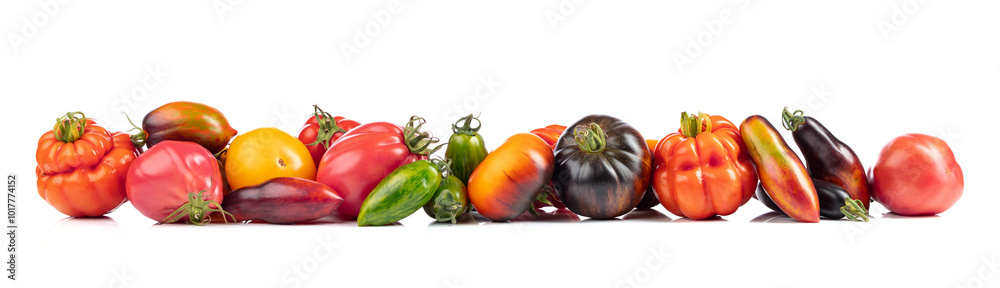 Poster Different tomatoes isolated on white background.