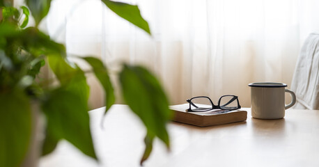 Cozy Morning Scene With Mug, And Book On Table