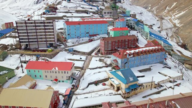 Drone Fly Touristic Ex mining Town of Sewell, Chile, Snowy Andean cordillera mountain location
