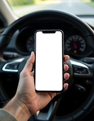 Closeup of driver hand holding a mobile phone with blank screen mockup in the car