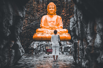 Samut Sakhon, Thailand - September, 25, 2024 : Meditation in Front of a Golden Buddha in Lak Si...