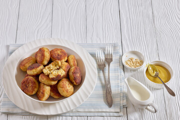Northern Pike fish cakes in a white bowl