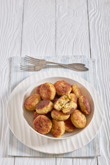 Northern Pike fish cakes in a white bowl
