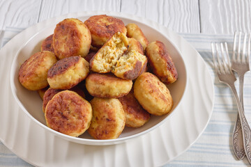 Northern Pike fish cakes in a white bowl