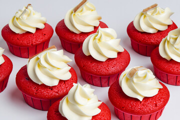 Cupcake with red . dessert cake food concept. and red cupcake with cream and confectionery on white . a white and red cake with confectionery on a white and a red cupcake on a white lifestyle.