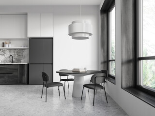 Modern home kitchen interior with dining table, cabinet and panoramic window