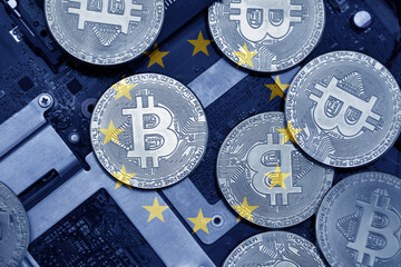 flag of european union on the bitcoins with computer electronic circuit board background. bitcoin...