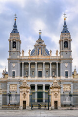Facade of the Almudena Cathedral in Madrid, Spain