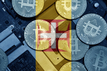 flag of madeira on the bitcoins with computer electronic circuit board background. bitcoin concept