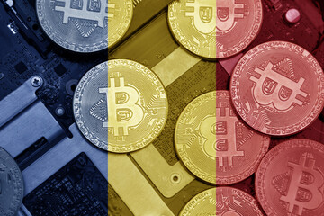 flag of romania on the bitcoins with computer electronic circuit board background. bitcoin concept