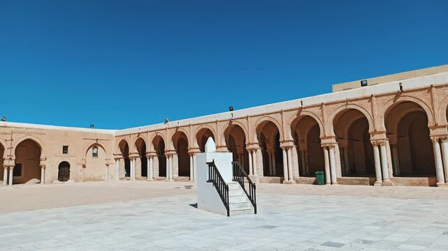 The Great Mosque of Kairouan, also known as the Mosque of Uqba, is a significant Islamic landmark built in the 7th century. It features an ancient minaret, marble columns, and beautiful domes.