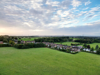 High Angle View of British Agricultural Farms at Streatley Village and Countryside Landscape of Bedfordshire, England Great Britain of UK. Footage Was Captured with Drone's Camera on October 7th, 2024