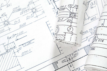 architect design working drawing sketch plans blueprints and making architectural construction model in architect studio,flat lay..