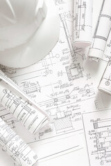 architect design working drawing sketch plans blueprints and making architectural construction model in architect studio,flat lay..