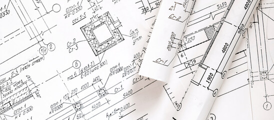 architect design working drawing sketch plans blueprints and making architectural construction model in architect studio,flat lay.