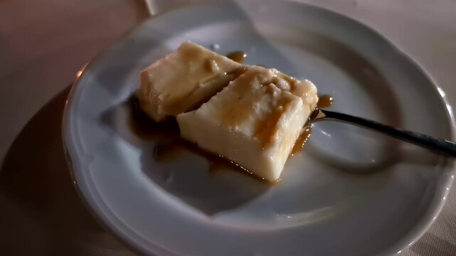 Galaktoboureko is a baked custard pudding with a sweet sauce