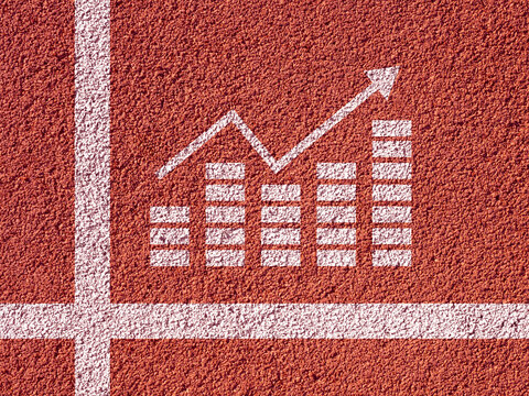 Growth chart on asphalt. Chart up on red treadmill. Financial markings on asphalt. Graph shows increase in profits. Growth of economic indicators. Receiving additional profit. Income chart at ground - Powered by Adobe