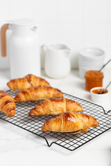 freshly baked delicious croissants with apricot jam