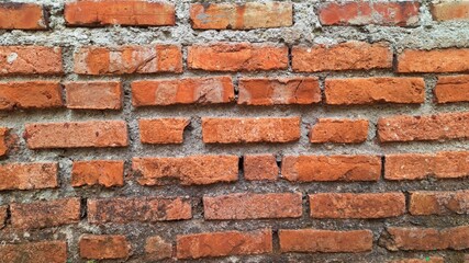A brick wall that has been completed