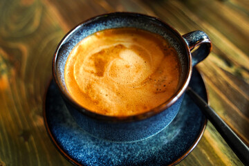 Cappuccino foam in a cup in a coffee shop