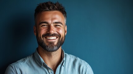 Portrait of a happy handsome man in a shirt with laughing
