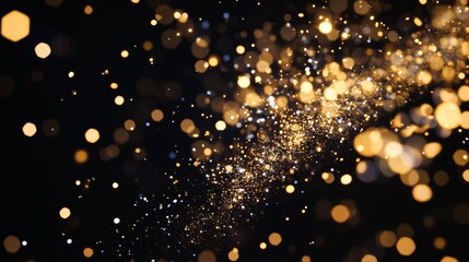 Shimmering golden particles floating in the air create a magical atmosphere during a nighttime celebration. With copy space for text.