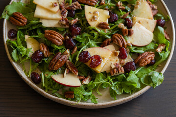 Fall Salad with Arugula, Apples, Cranberries, and Pecans - Close-Up