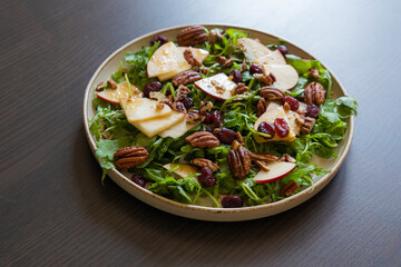 Fall Salad with Arugula, Apples, Cranberries, and Pecans - Close-Up
