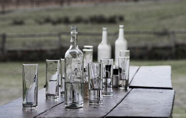 wine bottles and glasses on the table 