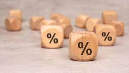 Wooden Blocks featuring Percentage Symbols used for Understanding Financial Concepts Effectively