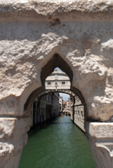 taly, Venice - (05/05/2021) The bridge of sighs known today as the Love Bridge, it was originally the bridge that prisoners crossed before being locked up in Venetian prisons