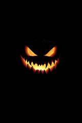 Fototapeta premium Glowing Jack-o'-Lantern with Fangs