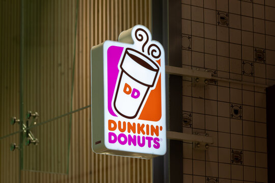 Dunkin' Donuts sign. Dunkin' Donuts is a doughnut company and coffeehouse chain. the Netherlands. 15 January 2023. 