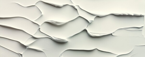 Textured white paint on a canvas with subtle grooves and layers.