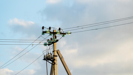 Old power lines at sunset