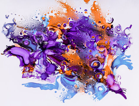 Colorful abstract ink explosion on white background