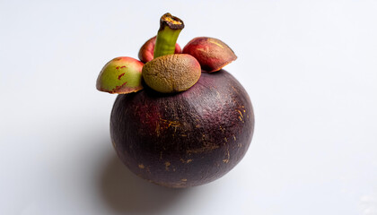mangosteen fruit, isolated on a clean, smooth white background