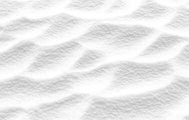 Obraz premium A new snowfall appears as if it has been shaped by the wind, creating a dune-like surface. A background made of abstract snow texture in the winter.
