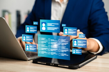 Human resource technology, HR recruitment and team management, Human resource manager reviewing...