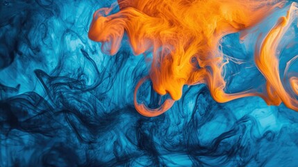 Abstract ink swirls in vibrant blue and orange, forming dynamic patterns and fluid shapes in water