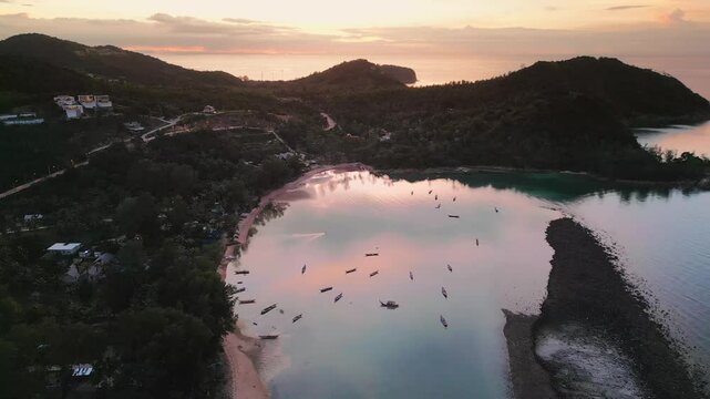 Ko Pha-ngan Sunset Thailand's Travel Island, Aerial View of lush tropical jungle with Calming Sea, panoramic