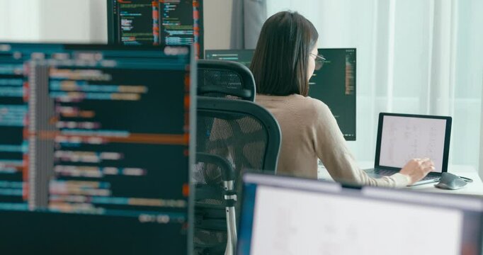 Group Adult Asia male, female freelance typing write prompt AI bot IT app smart program nomad, video game, terminal with coding language, user interface, designer, big data center on desktop computer.