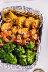 Lunch of shrimp and vegetables cooked in the oven