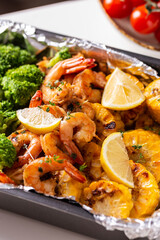 Lunch of shrimp and vegetables cooked in the oven