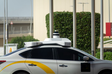 Abu Dhabi, Arab Emirates - February 15, 2023: City taxi. unmanned taxi