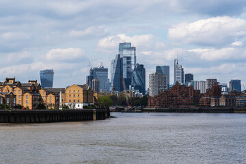 Skyline of modern London city with skyscrapers and brick buildings