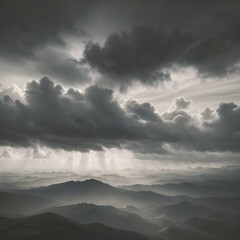 Obraz premium A moody sky with heavy gray clouds and soft sunlight peeking through, creating a dramatic contrast between light and shadow 