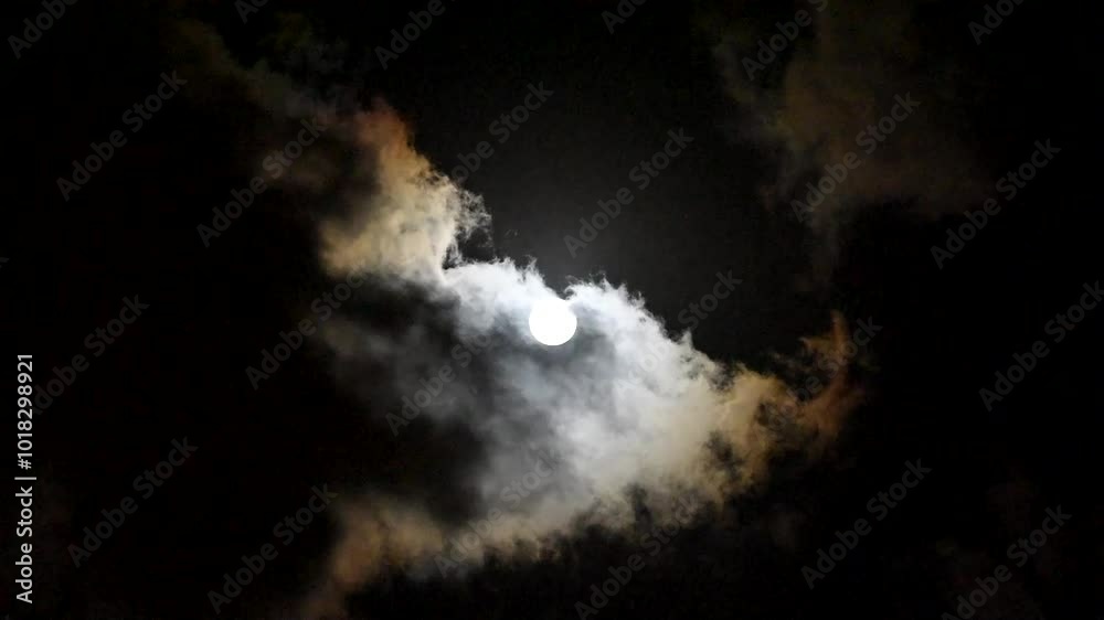 Wall mural moon and clouds partial lunar eclipse full moon and lunar eclipse full moon between the clouds super