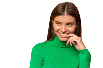 Portrait of curious woman touching lips with finger looking away